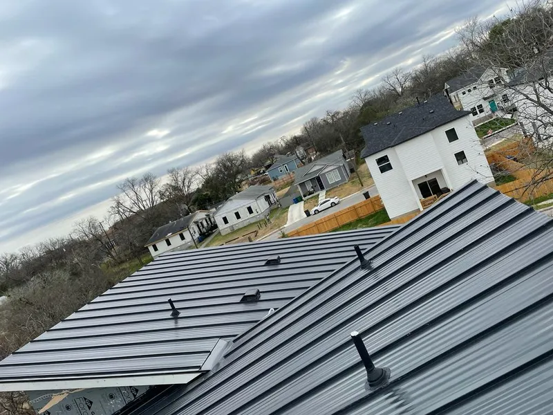 Standing seam metal roof panels with vents for Skylight Repair in Lavon